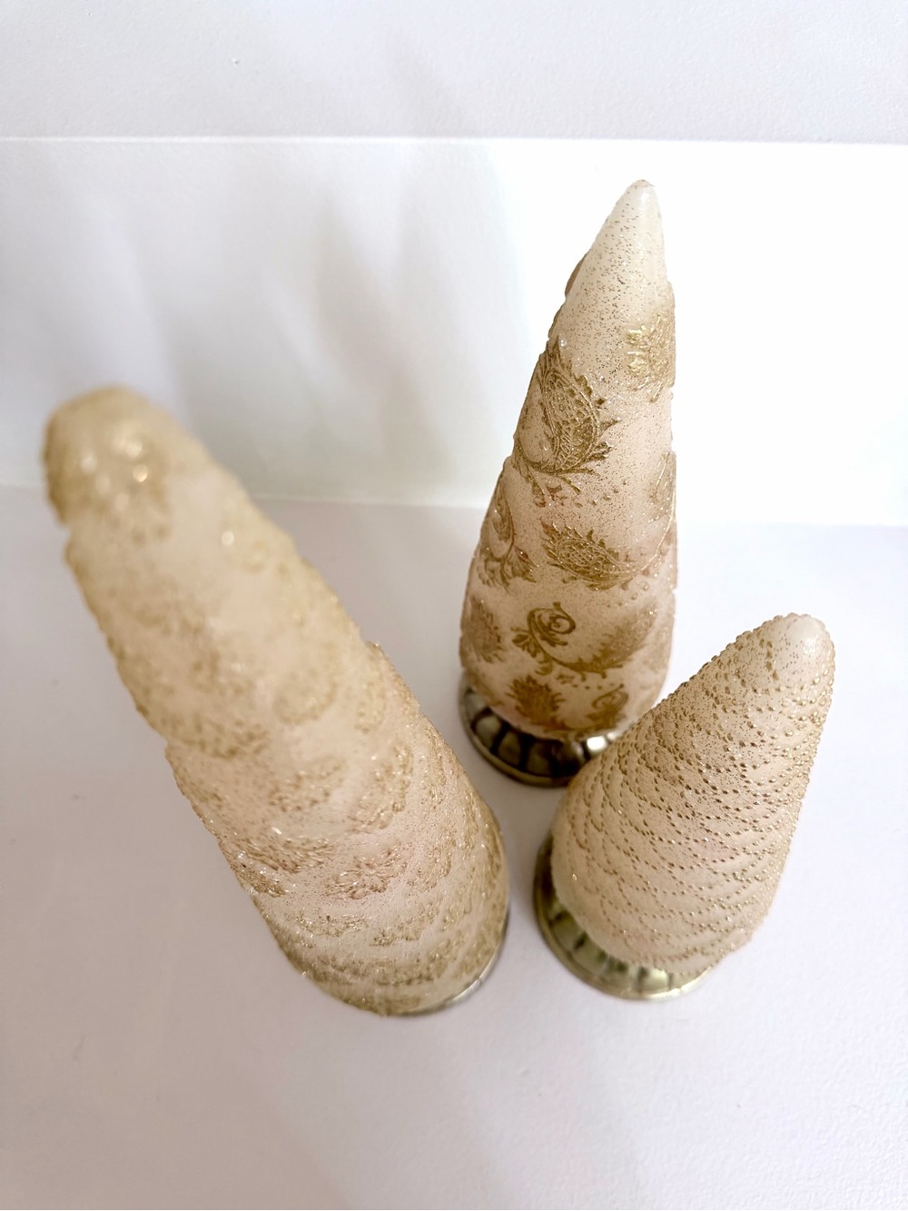 Three Illuminating Gold Wax Holiday Cone Trees - Picture 3 of 16